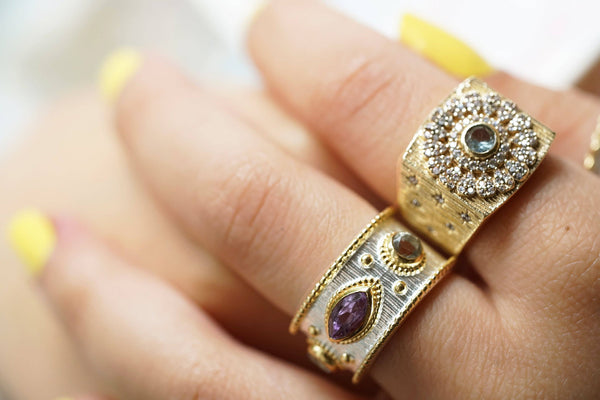 CISTUS RING IN GOLD AND BLUE TOPAZ
