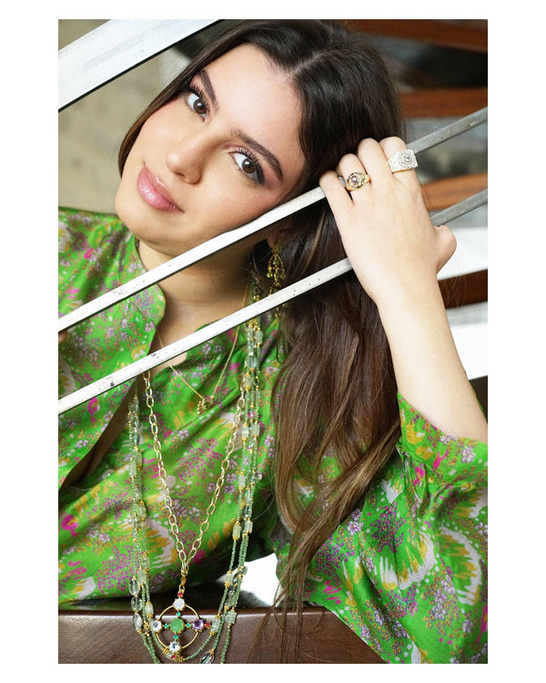 CISTUS RING IN GOLD AND BLUE TOPAZ