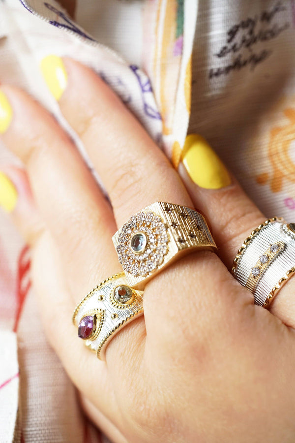 CISTUS RING IN GOLD AND BLUE TOPAZ